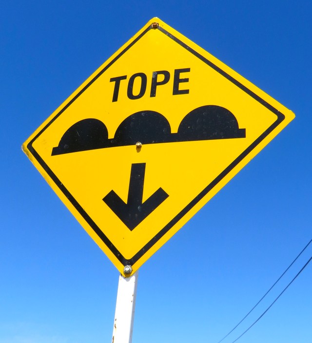 Tope warning sign on Calle Madero in Alamos. 